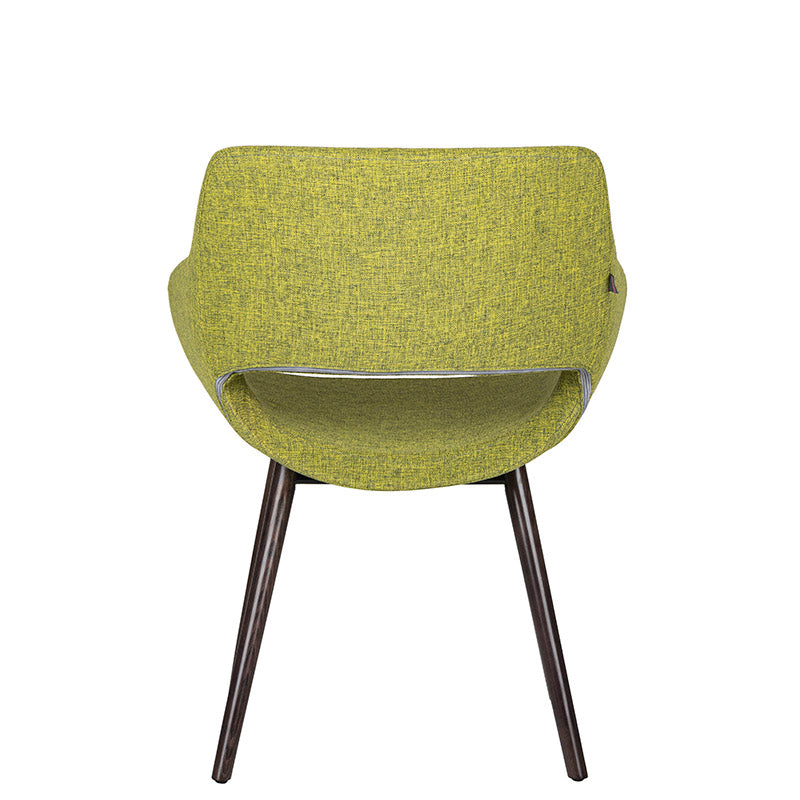 Sillón de visita Flok verde detrás con base de madera de haya disponible en colores Wenge, Negro y Natural.