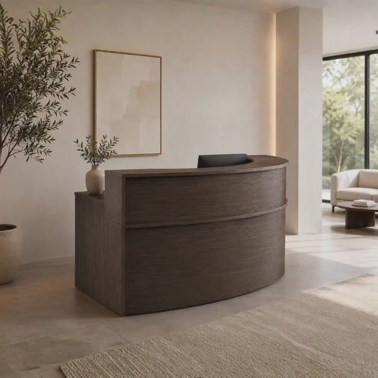 El Módulo de Recepción CURVA REC13 de Aura Muebles es ideal para optimizar la recepción de clientes. Su diseño moderno y ergonómico maximiza el espacio disponible y brinda una apariencia profesional a tu oficina. 
